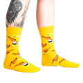 Lifestyle shot of a person wearing the yellow fried chicken socks.