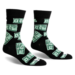 front view of two black socks with a green money bill pattern.