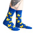 Lifestyle shot of a person's legs wearing the Rubber Duckie socks, showcasing the fit and design on a person.