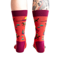 Rear view of the socks on a model, highlighting the sock's back design and heel.