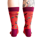 Rear view of the socks on a model, highlighting the sock's back design and heel.