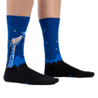 Lifestyle shot showing 'Stand Tall' socks on a person's legs.