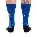 Rear view of 'Stand Tall' socks on a person's legs.