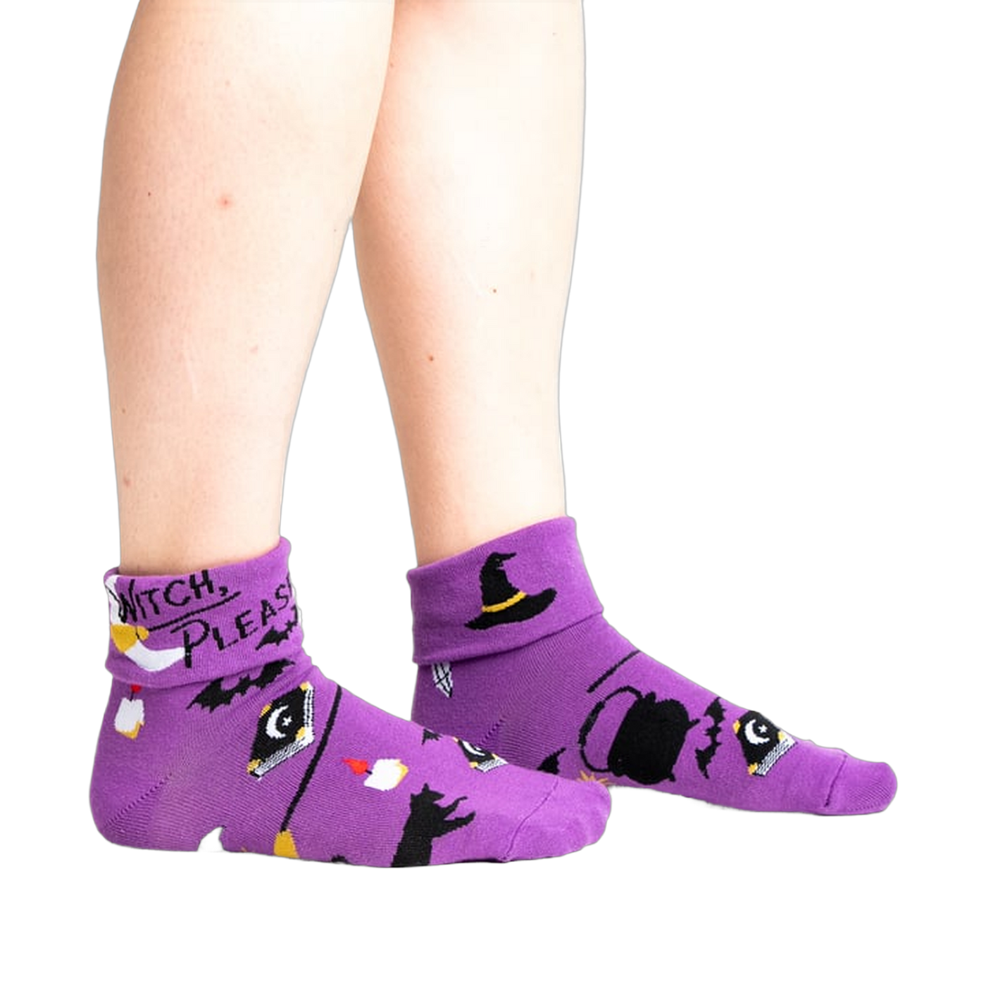 Lifestyle shot: Model wearing the purple 'Witch, Please' socks, showcasing the fit and style.