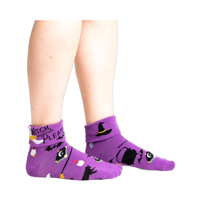 Lifestyle shot: Model wearing the purple 'Witch, Please' socks, showcasing the fit and style.