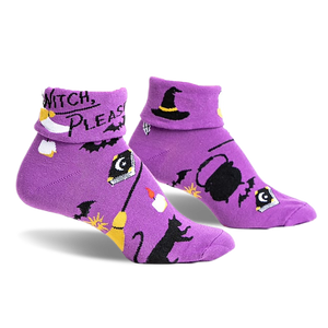 pair of purple socks with a black cat, a witch's hat, a cauldron, a broom, and the words 