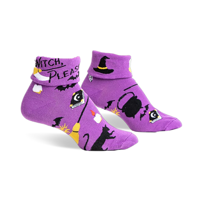 Pair of purple crew socks with a Halloween design. Features black bats, a witch's hat, cauldron, and the text 'Witch, Please'.