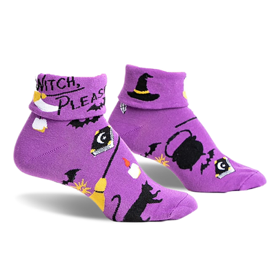 pair of purple socks with a black cat, a witch's hat, a cauldron, a broom, and the words "witch please" on them.  front view of the socks.