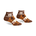 Brown and beige crew socks with a Bigfoot, snowflake, and tree design. Turn cuff detail.
