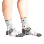 Another lifestyle shot: Model wearing the socks, showing how the cuffs sit on the ankles.