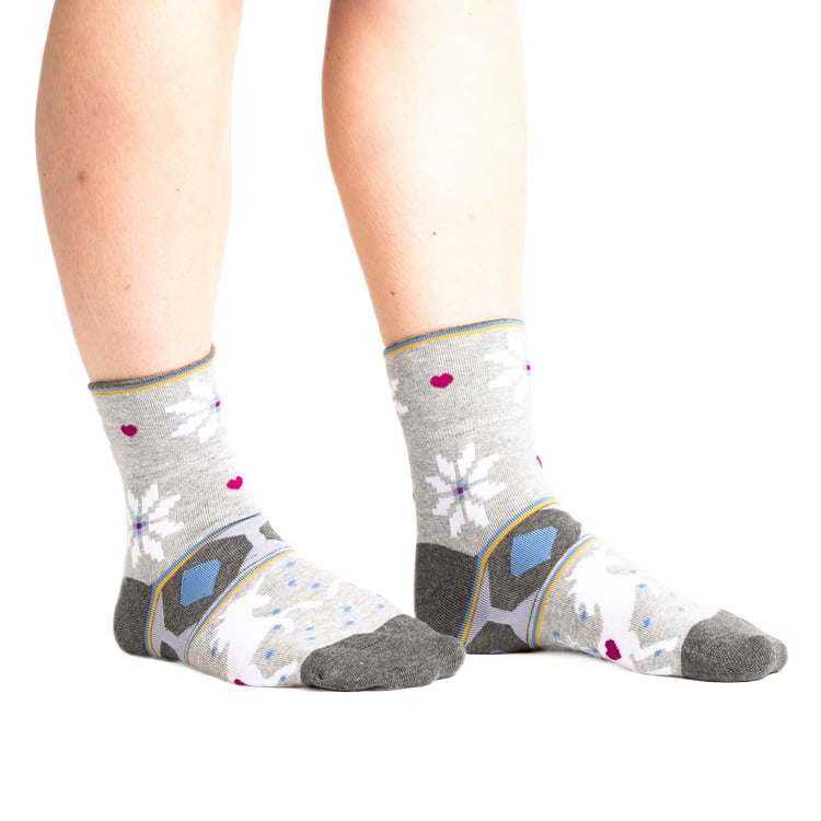 Another lifestyle shot: Model wearing the socks, showing how the cuffs sit on the ankles.