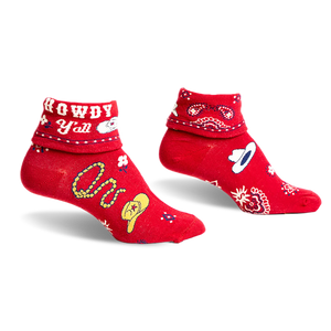 front view of a pair of red socks with a white and blue paisley pattern.  the socks also have cowboy hats and the phrase 