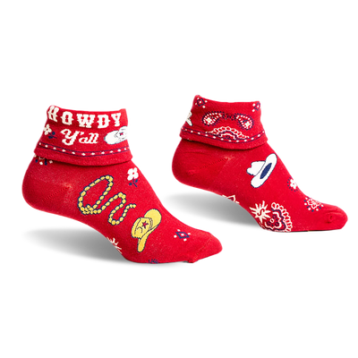 front view of a pair of red socks with a white and blue paisley pattern.  the socks also have cowboy hats and the phrase "howdy y'all" printed on them.