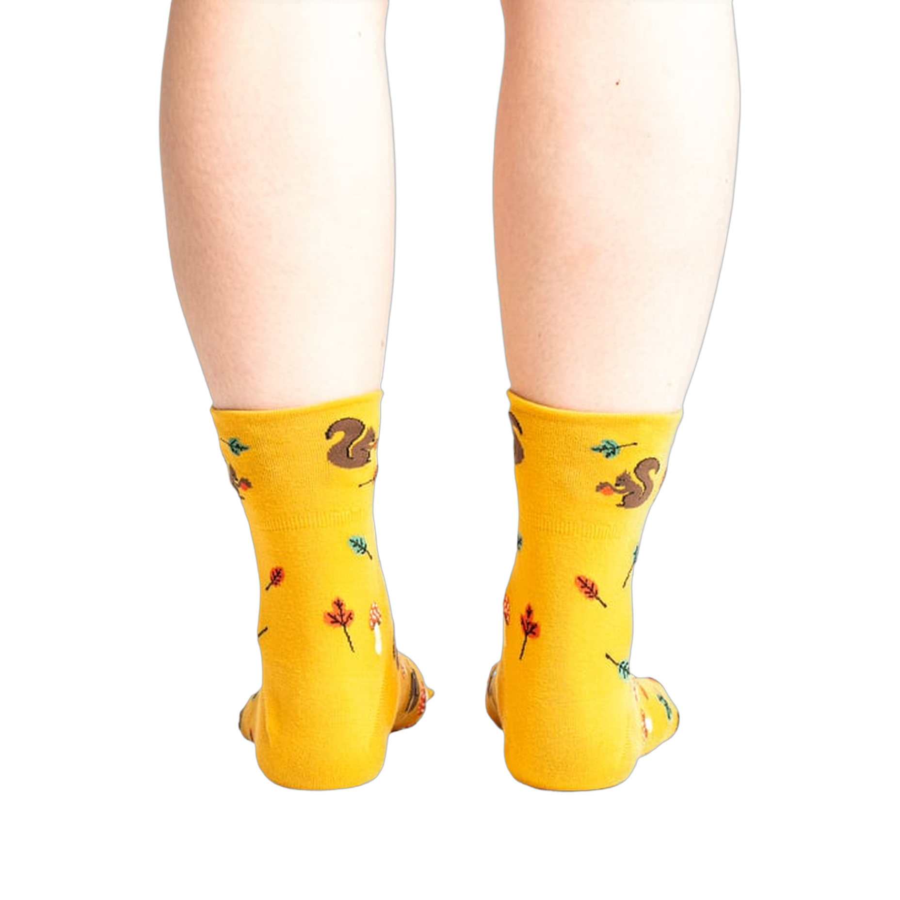 Rear view of a person wearing mustard yellow socks with a squirrel design.