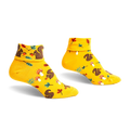 Pair of mustard yellow ankle socks featuring a playful pattern of squirrels, mushrooms, and leaves. Turn-cuff design.