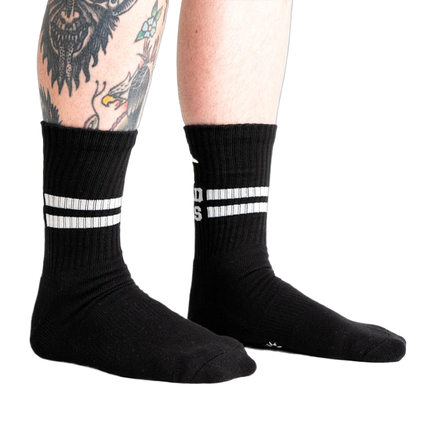 Lifestyle shot showing black Bad Ass Athletic Ribbed socks on a person's legs.