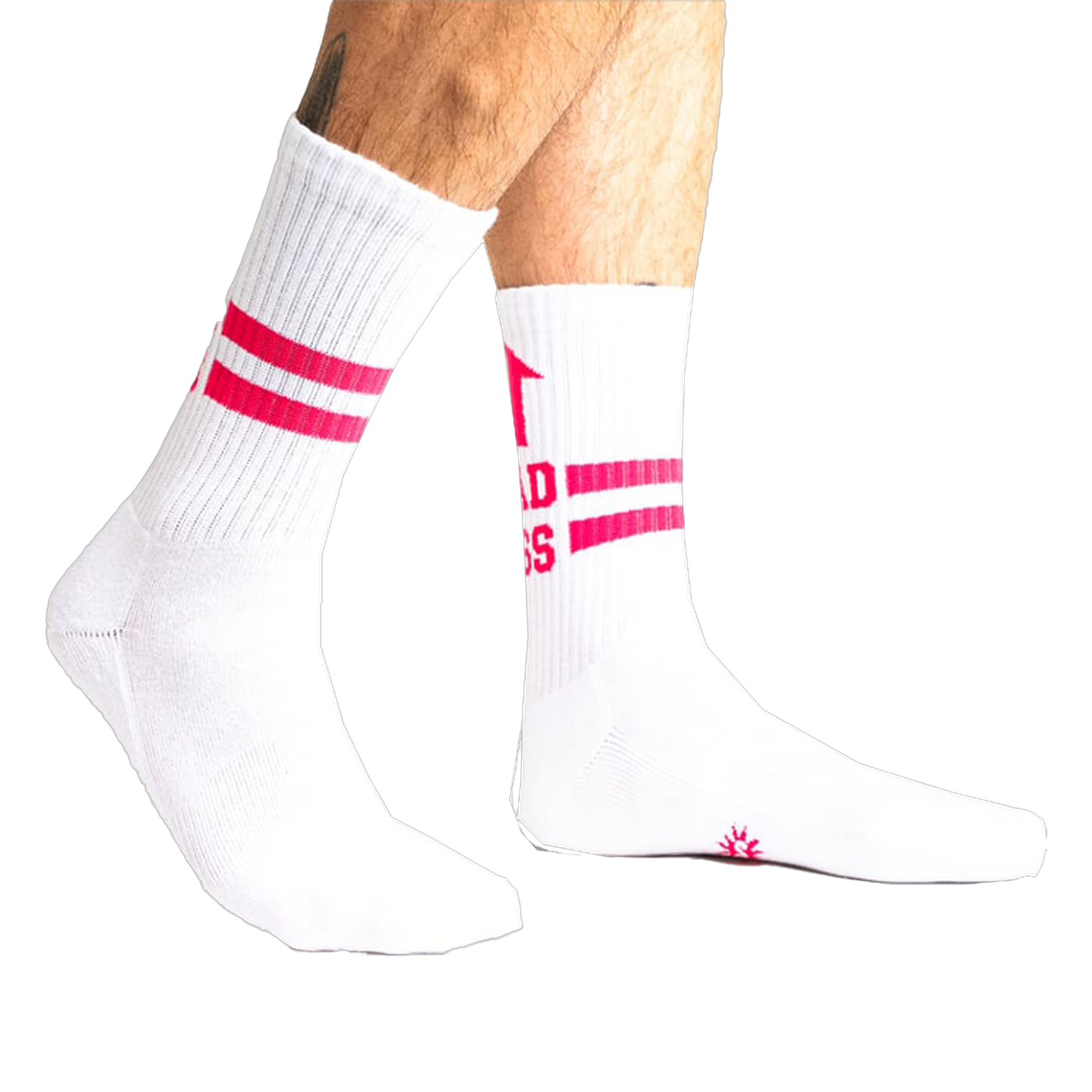 Lifestyle shot showing white Bad Ass Athletic Ribbed socks on a person's legs.