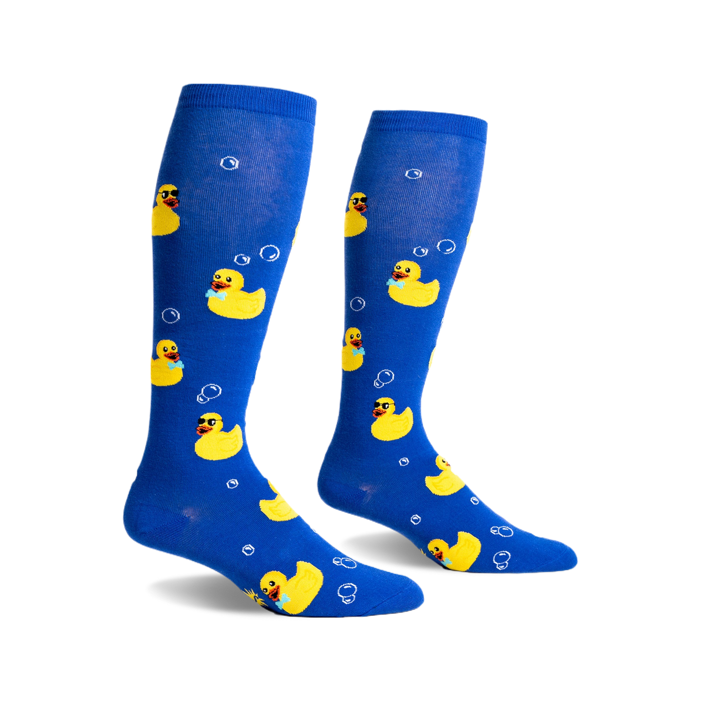 Pair of blue knee-high socks with yellow rubber duckies wearing sunglasses and bow ties, and white bubbles printed on them.