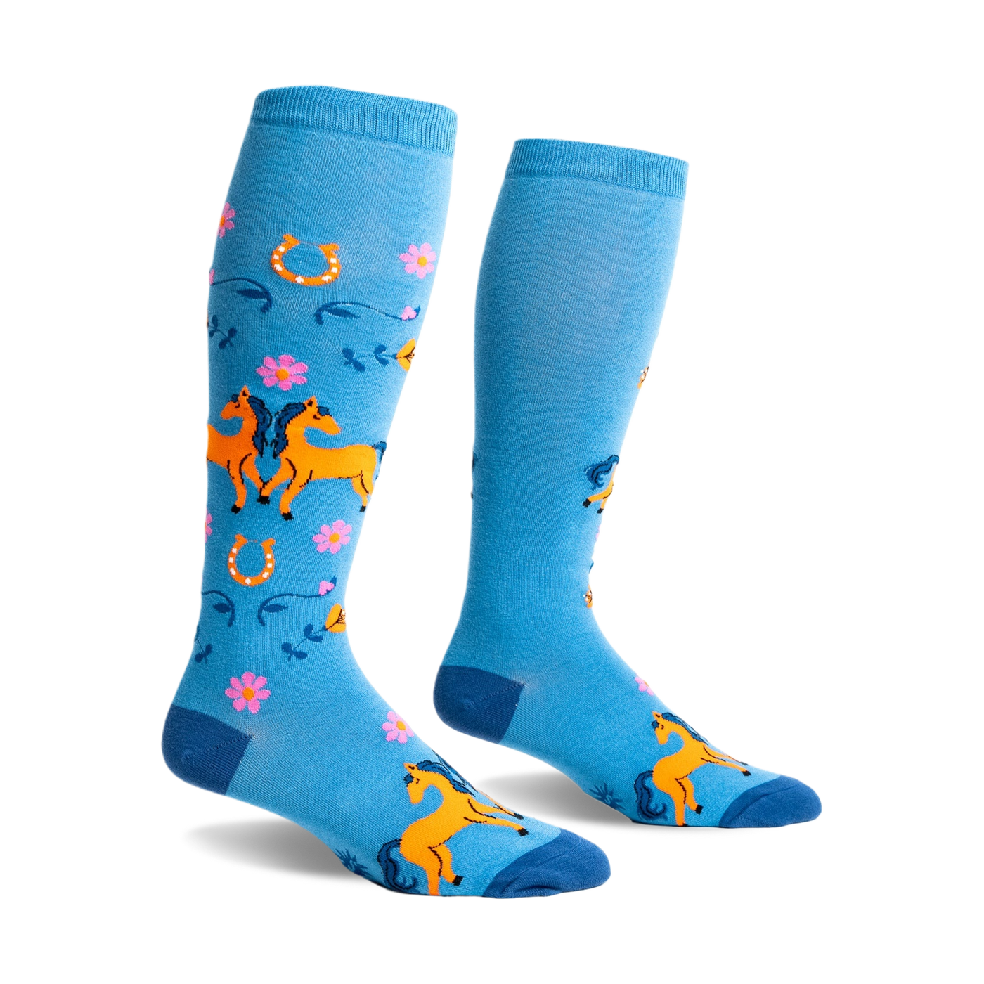 Pair of light blue knee-high socks with orange horses, pink flowers, and horseshoes. Fun, whimsical design.