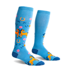 Pair of light blue knee-high socks with orange horses, pink flowers, and horseshoes. Fun, whimsical design.
