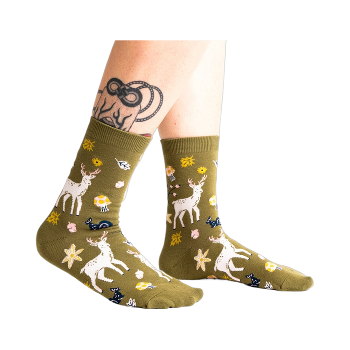 Lifestyle shot showing the socks on a model's legs, highlighting the fit and style.