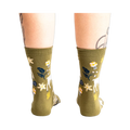 Back view of the socks on a model's legs, showcasing the design from a different angle.