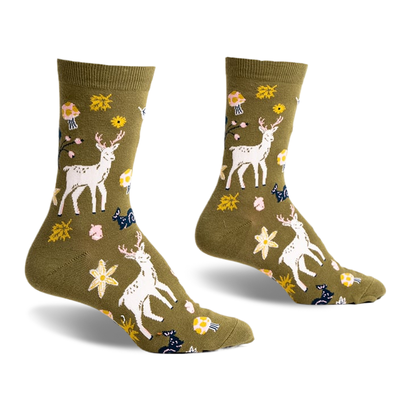 Olive green crew socks with a whimsical design featuring white deer, mushrooms, flowers, and leaves.