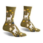 Olive green crew socks with a whimsical design featuring white deer, mushrooms, flowers, and leaves.