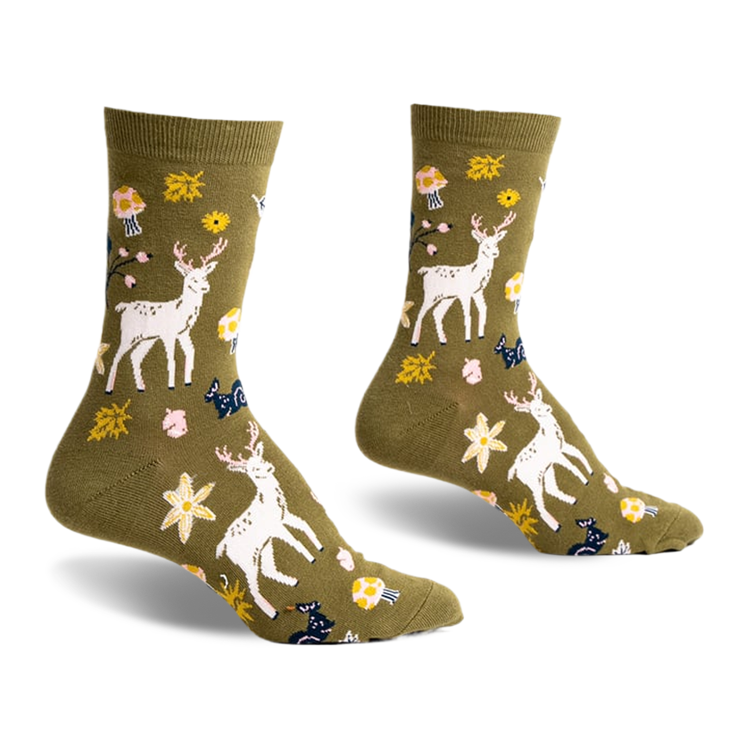 Olive green crew socks with a whimsical design featuring white deer, mushrooms, flowers, and leaves.