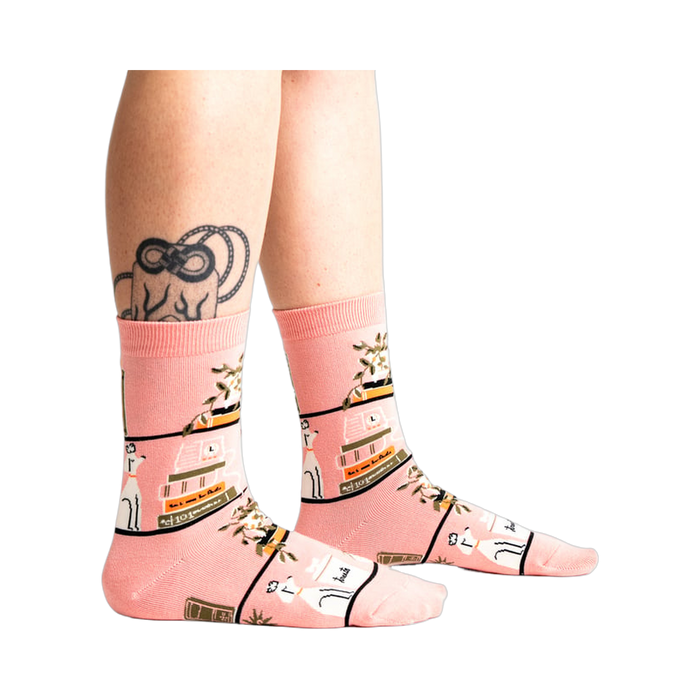 Lifestyle shot of 'A Novel Idea' socks on a person's legs, showing how the socks look when worn.