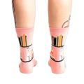 Rear view of the 'A Novel Idea' socks on a model's legs.