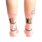 Rear view of the 'A Novel Idea' socks on a model's legs.