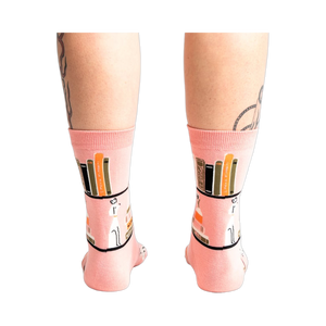 Rear view of the 'A Novel Idea' socks on a model's legs.