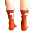 Back view of the PSL socks on a model's legs, highlighting the full design.