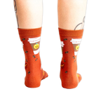 Back view of the PSL socks on a model's legs, highlighting the full design.