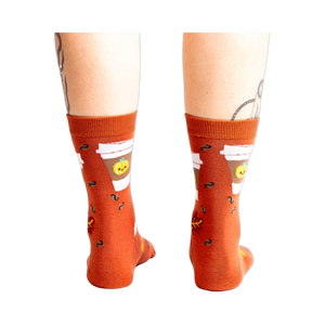 Back view of the PSL socks on a model's legs, highlighting the full design.