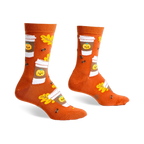 Pair of crew socks in burnt orange featuring a pattern of pumpkin spice latte cups, autumn leaves, and coffee beans.