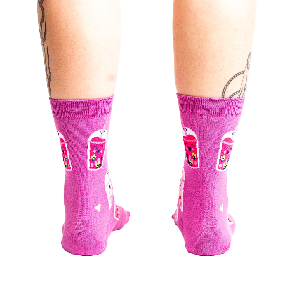 Back view of a person wearing the 'Feeling Bubbly' socks, showcasing the design on the back of the socks.