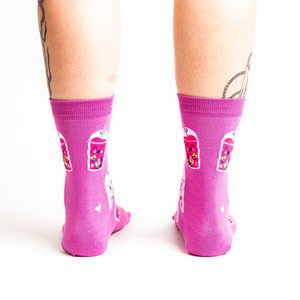 Back view of a person wearing the 'Feeling Bubbly' socks, showcasing the design on the back of the socks.