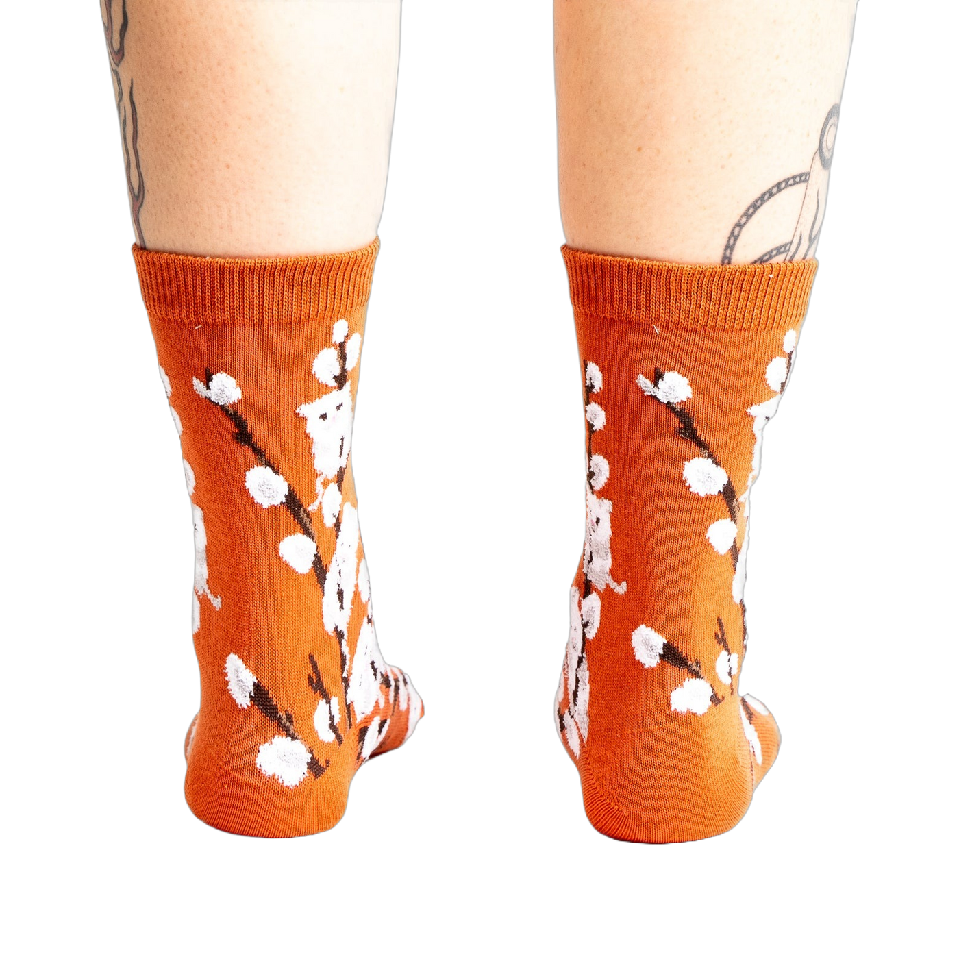Back view of the Kitten Willow socks on a person's legs, showcasing the full sock design.