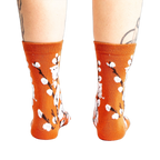 Back view of the Kitten Willow socks on a person's legs, showcasing the full sock design.