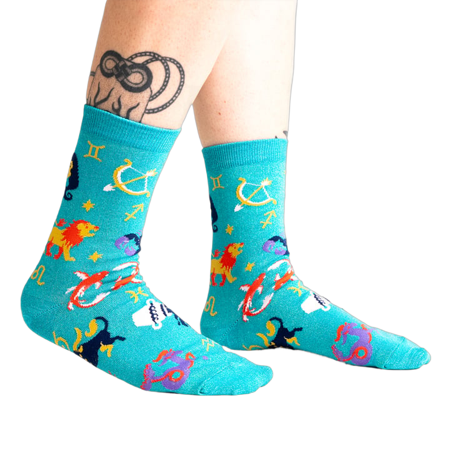 Lifestyle shot of a person wearing the teal zodiac socks.