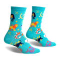 Teal crew socks with a whimsical zodiac design.  Features all 12 astrological signs and symbols in gold, purple, and other colors on a shimmering teal background.