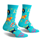 Teal crew socks with a whimsical zodiac design.  Features all 12 astrological signs and symbols in gold, purple, and other colors on a shimmering teal background.