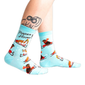 Lifestyle shot of Powder Hound socks on a person's legs, showing the socks' fit and style.