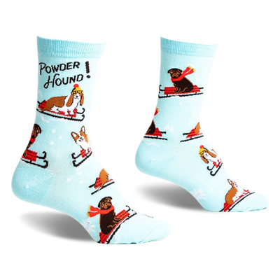 pair of light blue socks with dogs on sleds.  the socks have the words "powder hound" on one of the socks. front view of the socks.