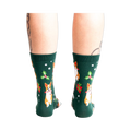 Back view of the socks on a person's legs.