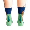 Rear view of the Sasquatch Campout socks on a model's legs.