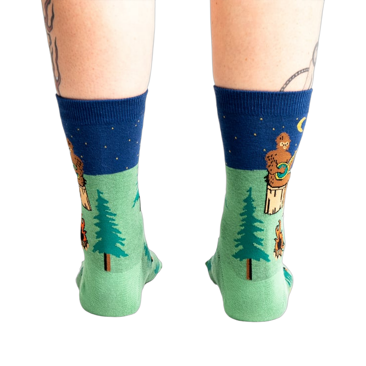 Rear view of the Sasquatch Campout socks on a model's legs.