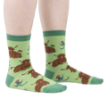 Lifestyle shot showing the socks on a person's legs, highlighting the fit and feel.